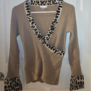 Super cute Venus ribbed knit wrap style top